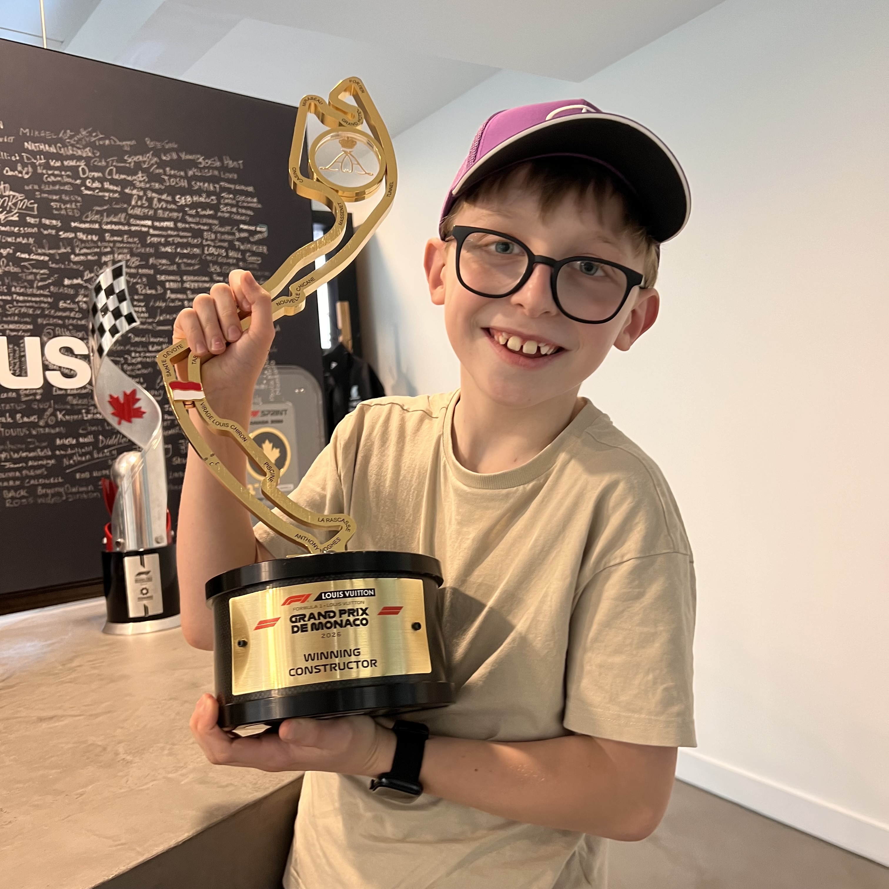 Ethan holding the same Monaco Grand Prix trophy